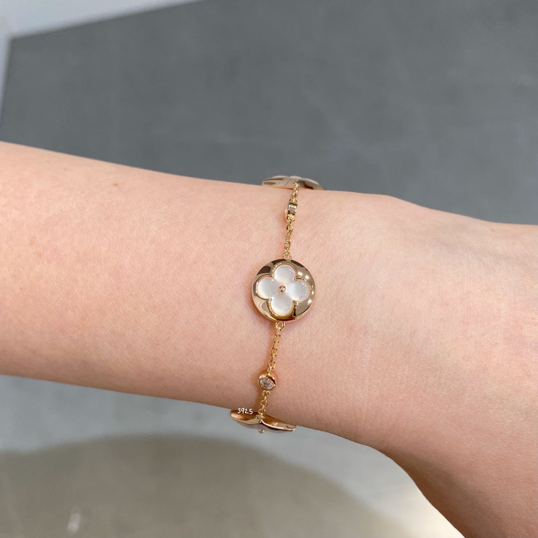 [Bloom]STAR AND SUN 4 MOTIF WHITE MOP PINK GOLD BRACELET